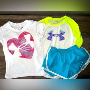 Under armor tops (2) one short sleeve and one long sleeve and Nike shorts